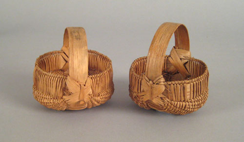 Appraisal: Two miniature splint oak buttocks baskets th c h w