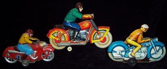 Appraisal: A German tinplate clockwork motorcycle with rider and two others