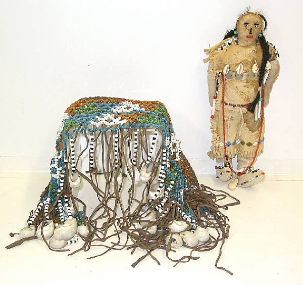 Appraisal: Two ethnographic items a Plains beaded doll a beaded collar