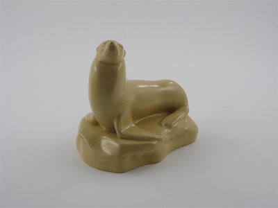 Appraisal: Sealion' a Wedgwood earthenware figure designed by John Skeaping covered