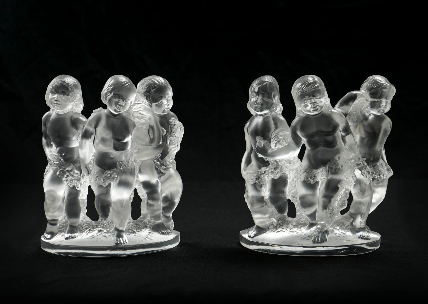 Appraisal: PR LALIQUE ''LUXEMBOURG'' CHERUB BOOKENDS A pair of frosted crystal