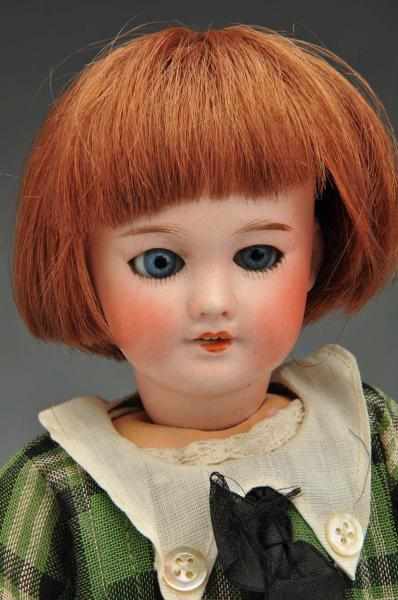 Appraisal: Bleuette Doll Description French Bisque incised SFBJ Paris open mouth