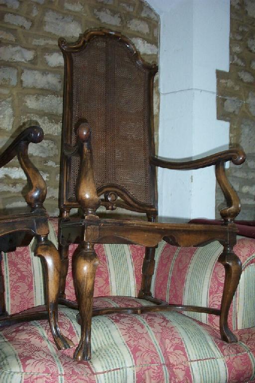 Appraisal: A pair of good quality Edwardian walnut elbow chairs to