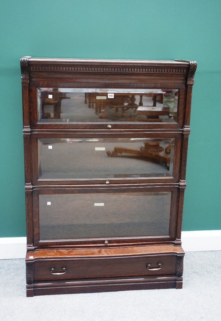 Appraisal: A th century oak Globe Wernicke four section bookcase three