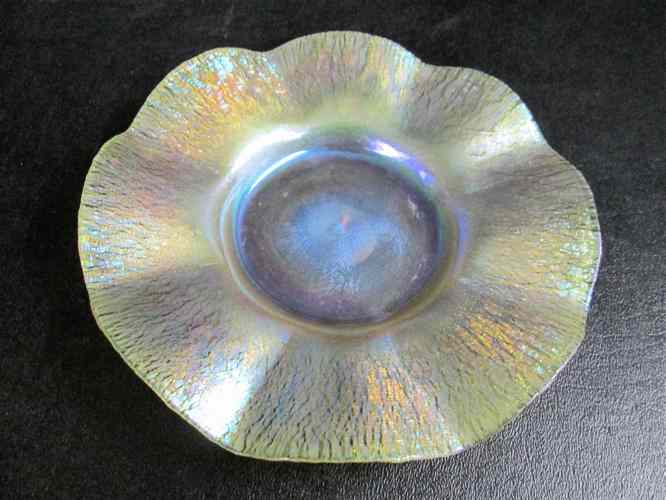 Appraisal: TIFFANY FAVRILE IRIDESCENT ART GLASS PLATE with wide undulating rim