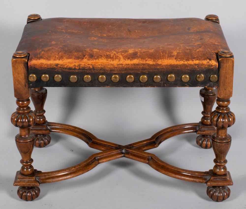 Appraisal: BAROQUE STYLE WALNUT BENCH the rectangular brass tacked padded seat