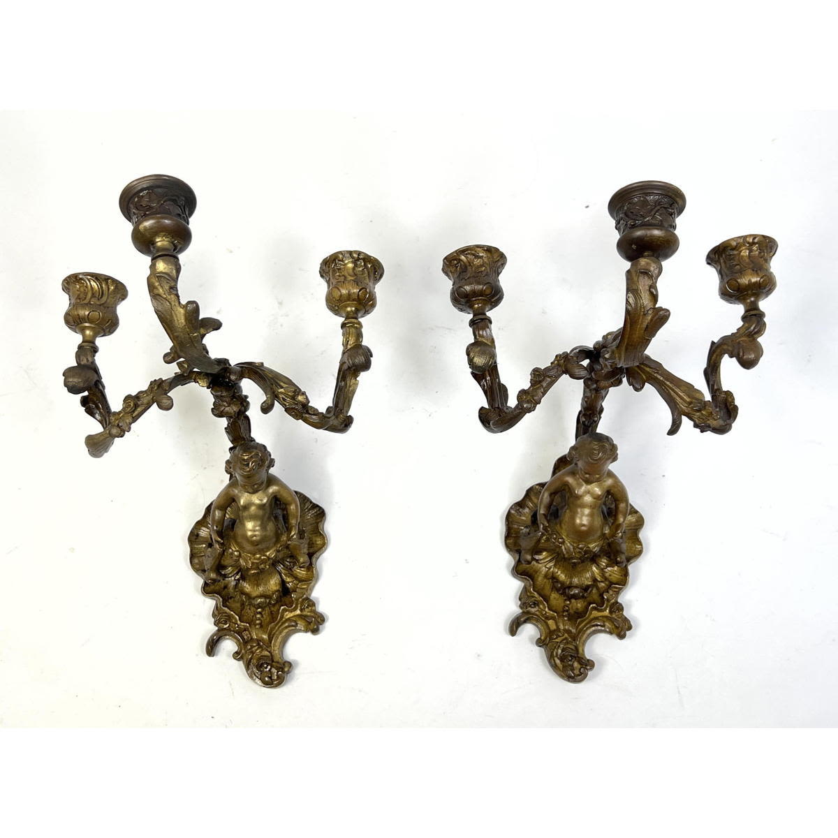 Appraisal: Pair of th century French bronze candle sconces with putties