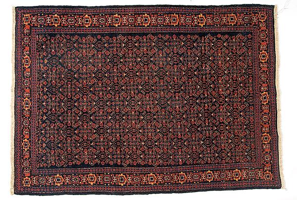 Appraisal: IRANIAN RUG Iranian th century in black ground with stepped