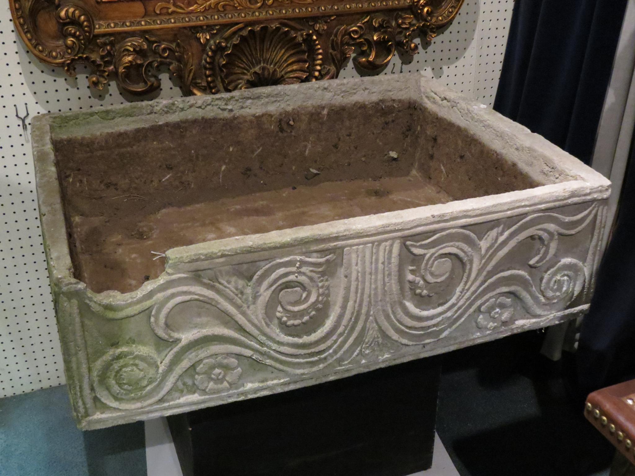 Appraisal: A large th century moulded concrete flower trough rectangular-shape sides