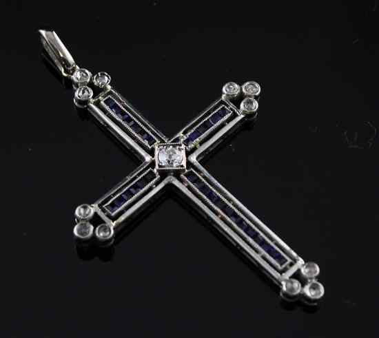 Appraisal: An ct white gold sapphire and diamond set cross pendant