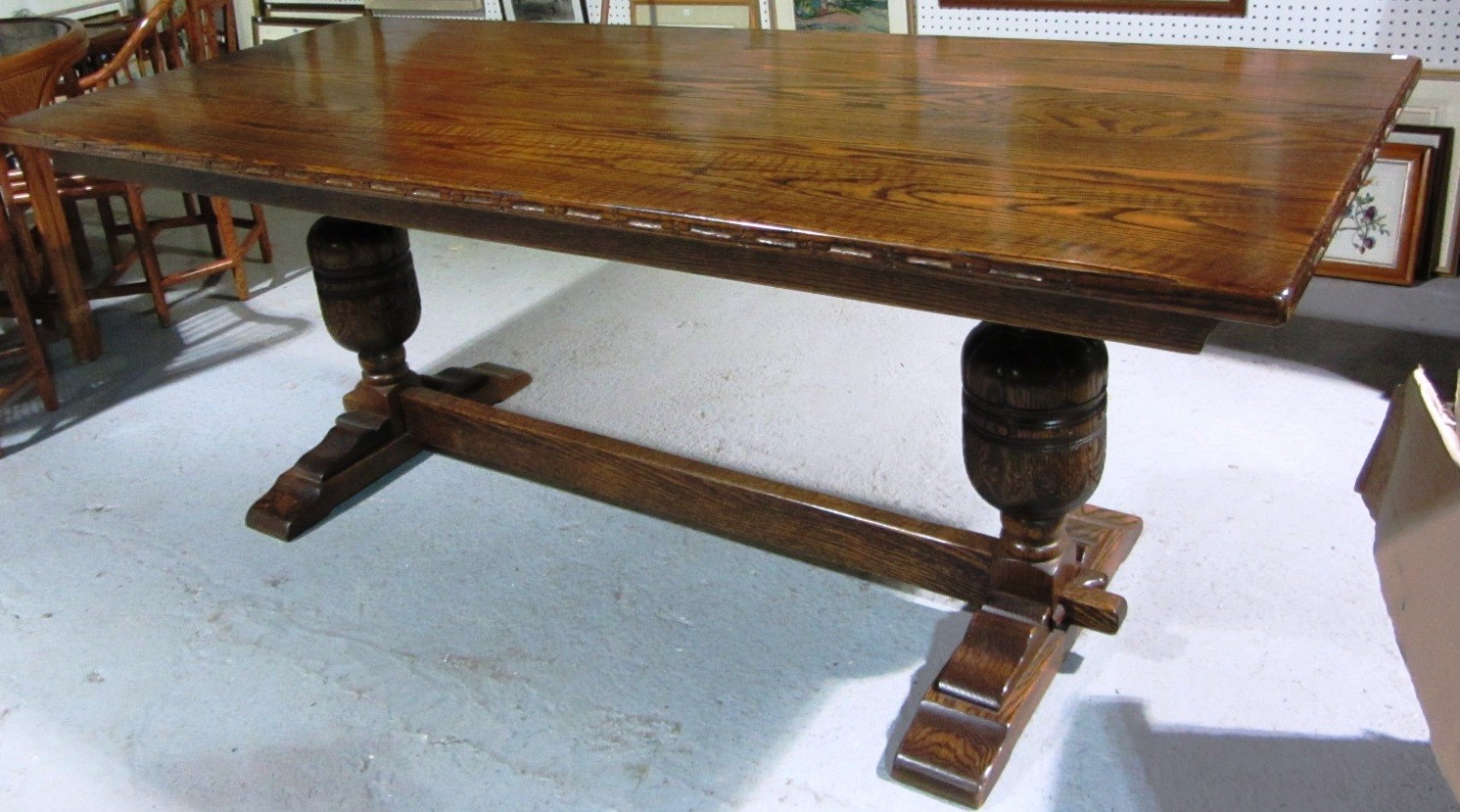 Appraisal: A th century oak rectangular dining table with bulbous caned