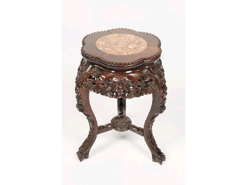 Appraisal: A CHINESE HARDWOOD URN STAND with carved decoration and an