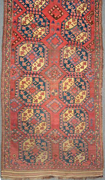 Appraisal: An Afghan rug size approximately ft x ft