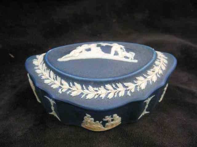 Appraisal: Wedgwood Dark Blue Jasperware Box cherubs on top oval ''