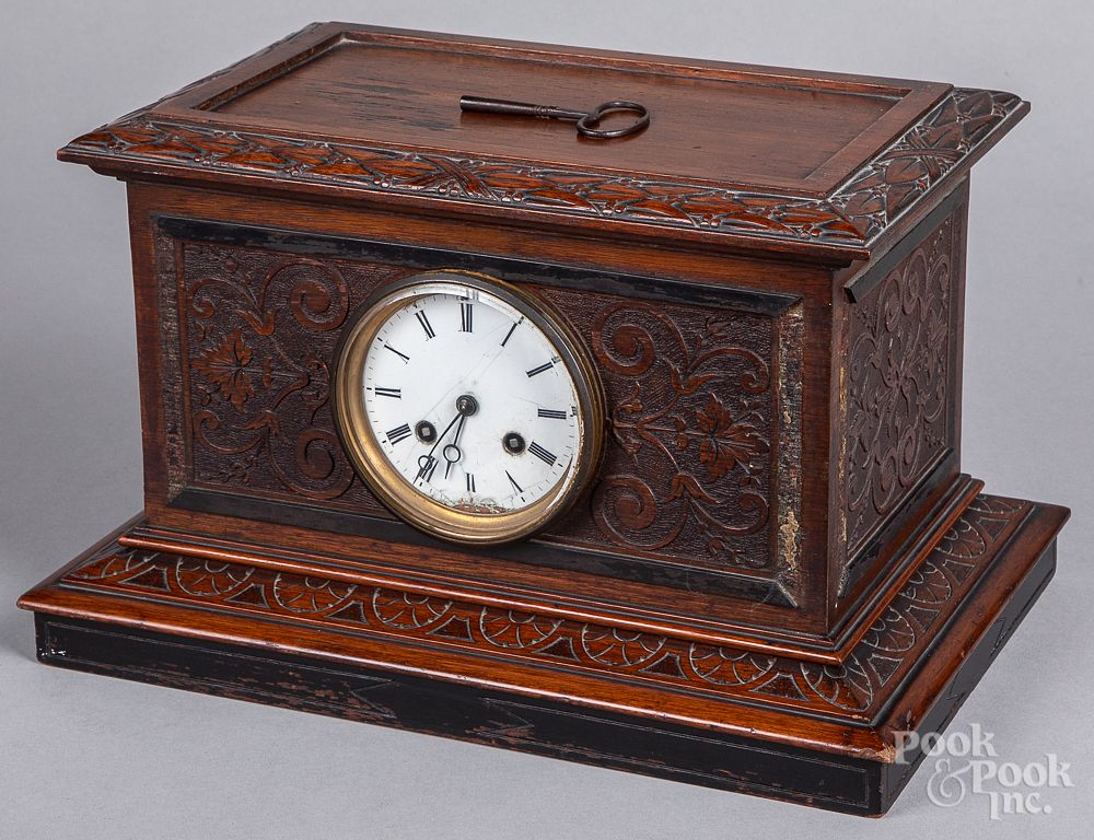 Appraisal: French carved mahogany mantel clock French carved mahogany mantel clock