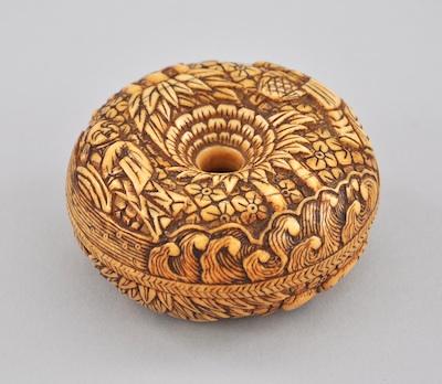 Appraisal: A Carved Ivory Box Round form with an opening in