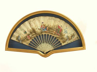 Appraisal: A Chinoiserie fan with painted paper leaf the ivory sticks