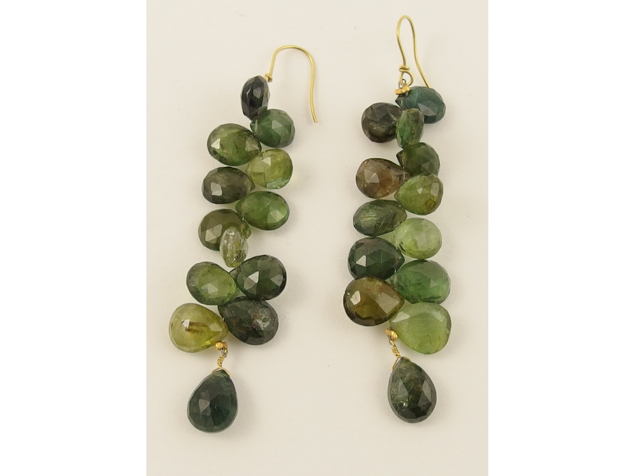 Appraisal: A pair of briolette cut tourmaline cluster earrings