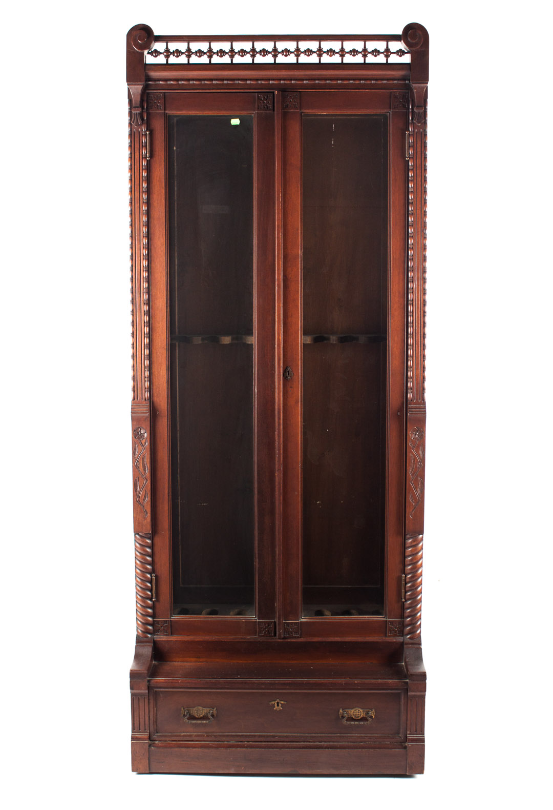 Appraisal: American Eastlake style walnut gun cabinet circa two long glazed