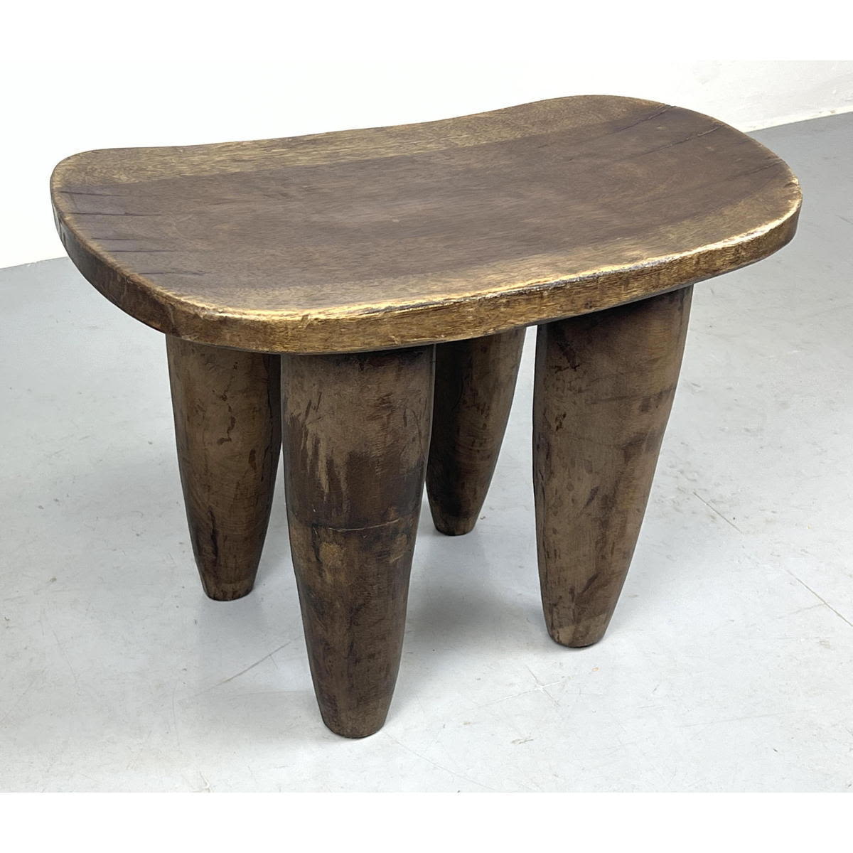 Appraisal: Solid wood rustic Senufo stool In the style of African