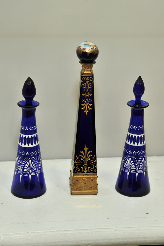 Appraisal: THREE COBALT PERFUME BOTTLES Including a pair of cobalt scent