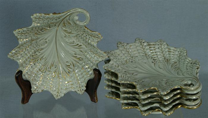 Appraisal: Mettlach salt glazed leaf plates with gilt decoration bubble gum