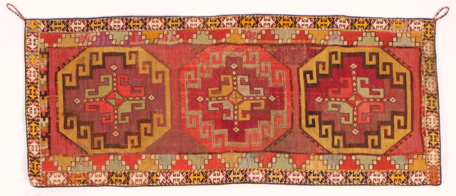 Appraisal: AN UZBEK MAFRASH PANEL with three central hooked octagons x