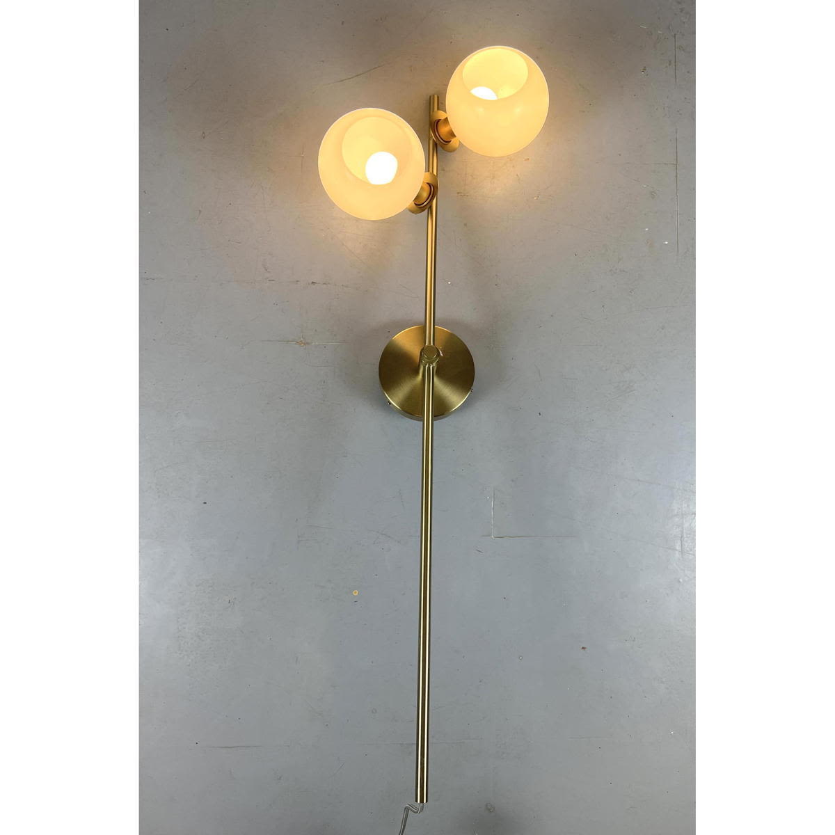 Appraisal: Contemporary Brass colored metal and Glass Ball wall sconce Dimensions