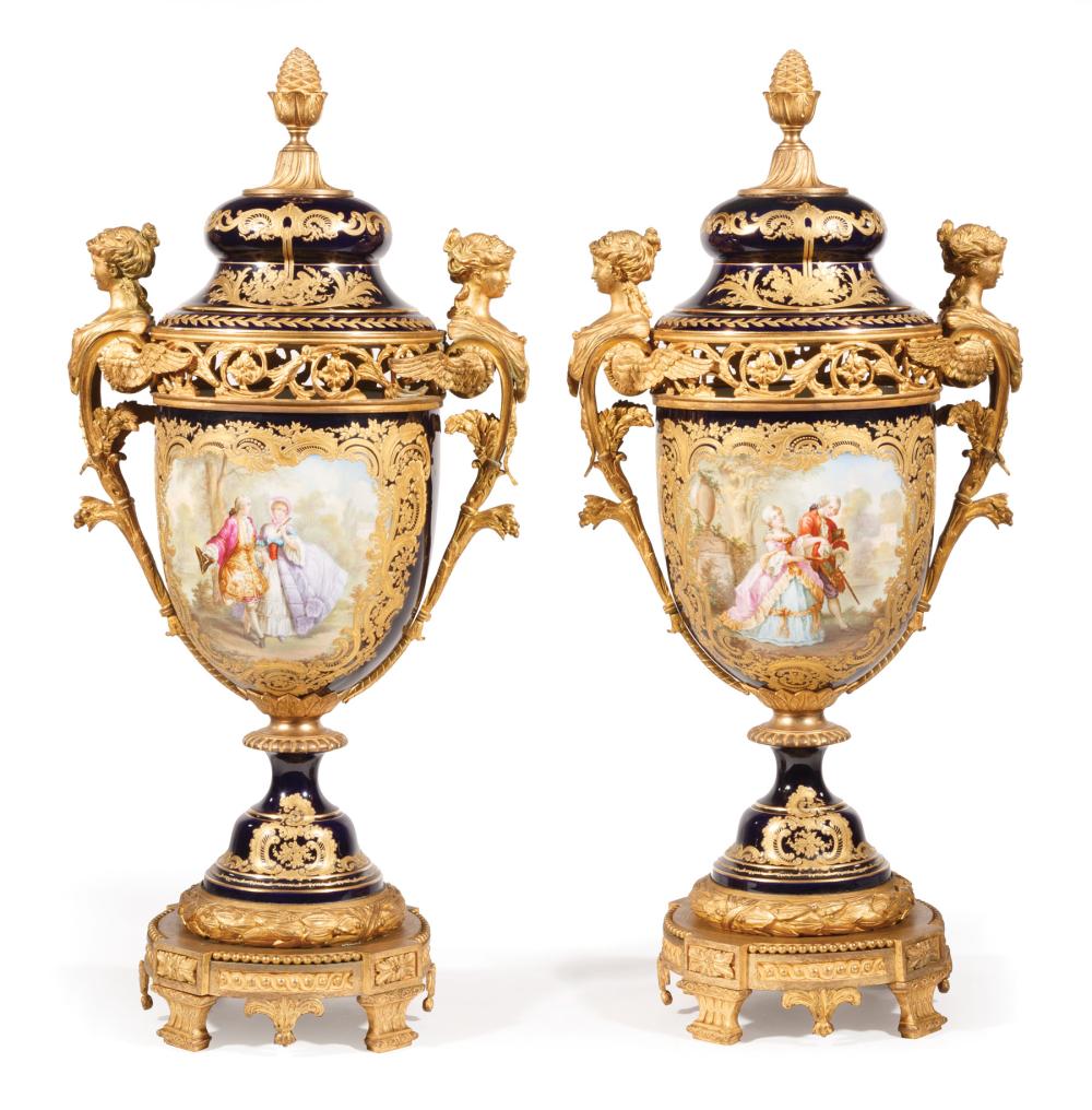 Appraisal: Pair of Bronze-Mounted Sevres-Style Polychrome and Gilt Porcelain Lidded Urns