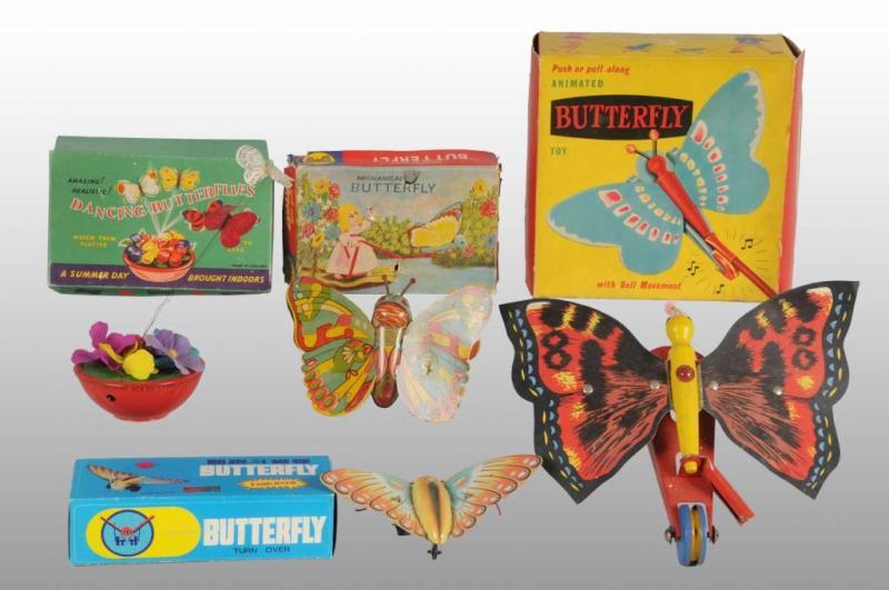 Appraisal: Lot of Butterfly Toys Description Includes one animated push-toy with