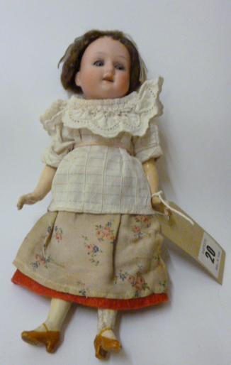 Appraisal: An SPBH bisque head doll with sleeping blue glass eyes