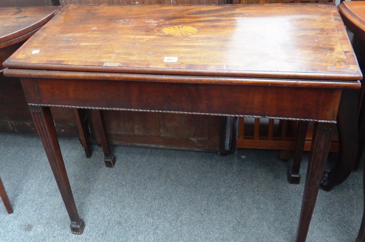 Appraisal: A George III inlaid mahogany card table the rectangular top