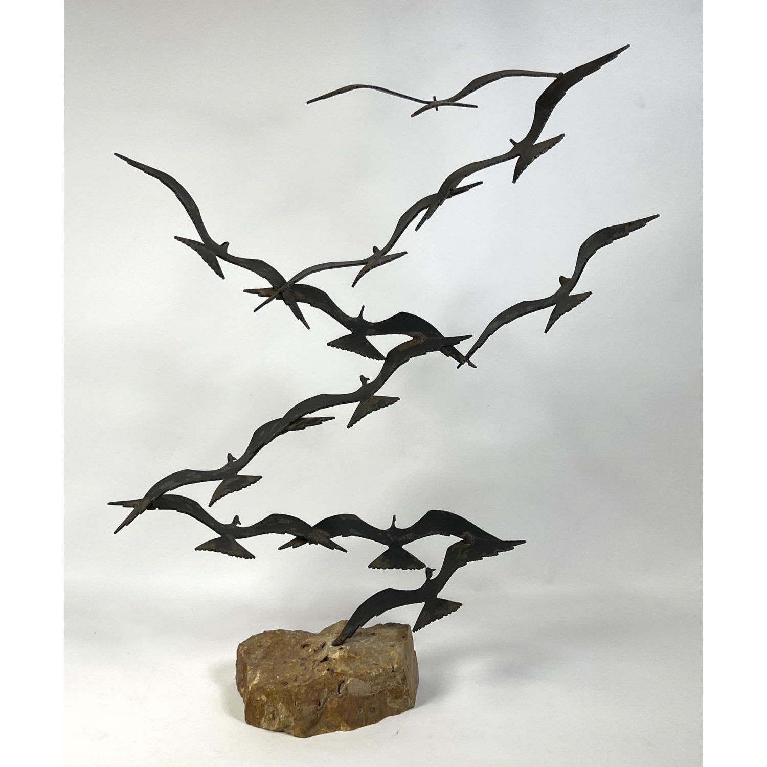 Appraisal: Bird metal statue Signed BIJAN Mounted on natural rock base