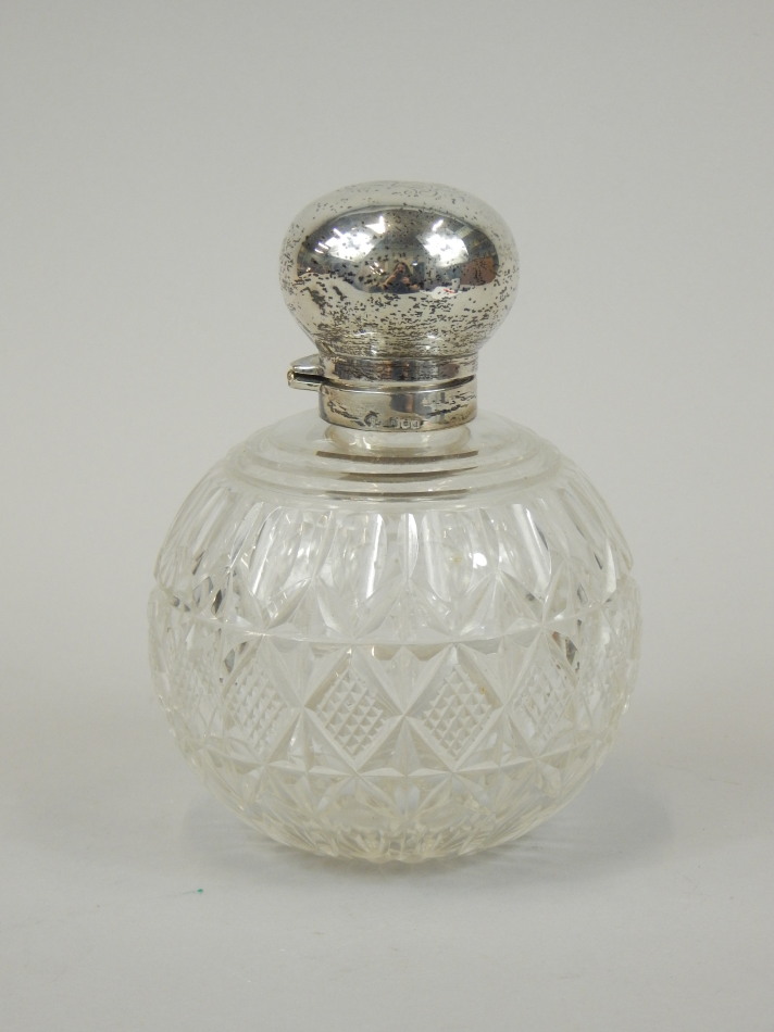 Appraisal: A late Victorian cut glass scent bottle with silver mount