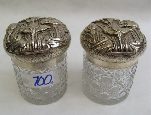 Appraisal: PAIR JAPANESE SILVER LIDDED GLASS DRESSER JARS The engraved and