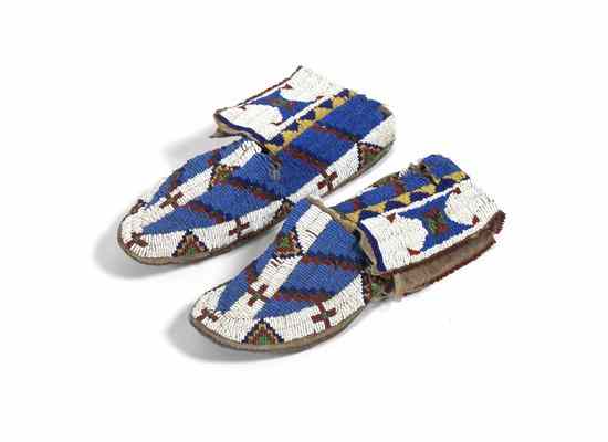 Appraisal: A Pair of Sioux Fully Beaded Moccasins circa - having