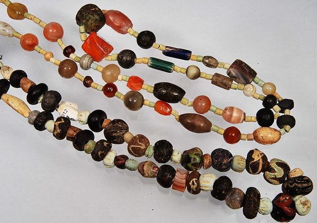 Appraisal: A MULTI-COLOURED CLAY BEAD NECKLACE long and an agate clay