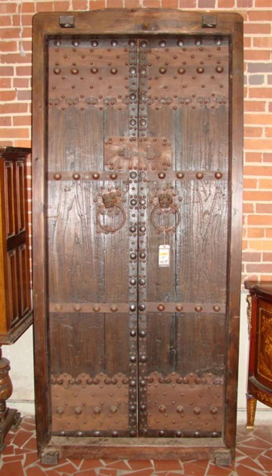 Appraisal: Pair Chinese wood and metal entrance doors late th century