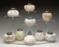 Appraisal: NINE MT WASHINGTON SALT SHAKERS One is an unfired Burmese