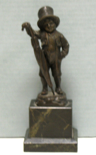 Appraisal: CAST BRONZE FIGURE OF A BOY WITH TAIL Standing with