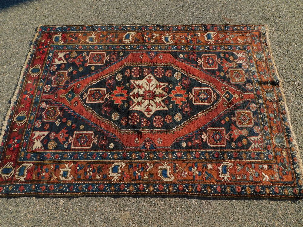 Appraisal: OLD SHIRVAN SCATTER RUG Semi-antique Shirvan scatter rug in red