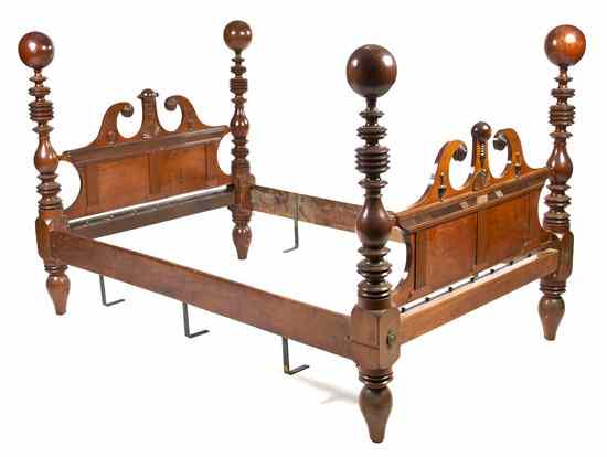 Appraisal: An American Four Post Bed having cannonball finials over the