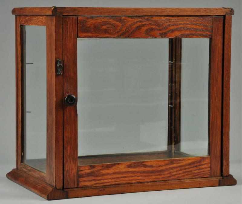 Appraisal: Small Oak Countertop Display Cabinent Description Includes glass shelves Condition