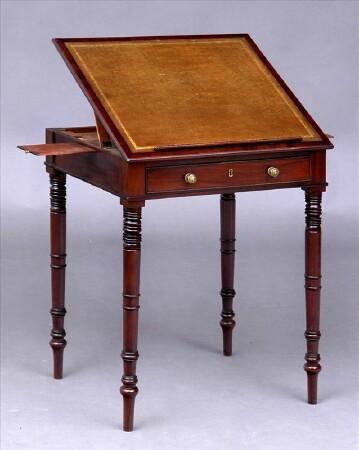 Appraisal: REGENCY MAHOGANY READING TABLE The hinged top with tooled leather