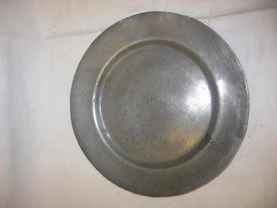 Appraisal: A SET OF SEVEN PEWTER PLATES the plain rims chased