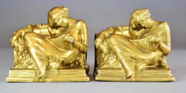 Appraisal: Rookwood Bookends of Woman ReadingNice pair of Rookwood bookends of