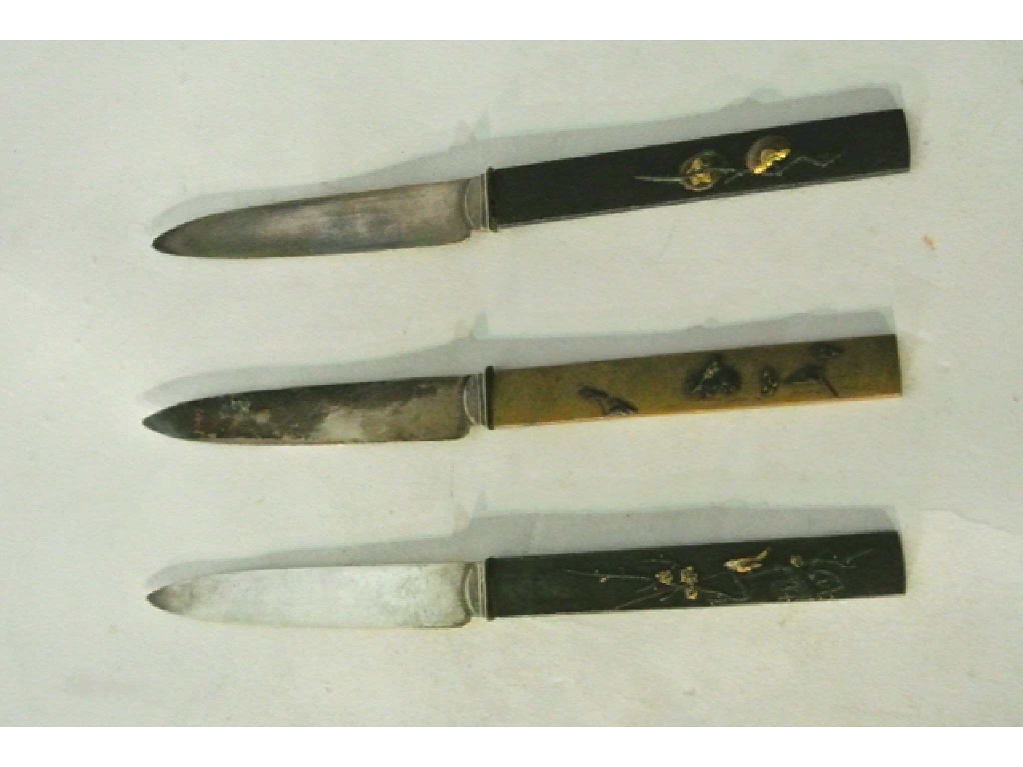 Appraisal: Three various Japanese style mixed metal fruit knives each handle