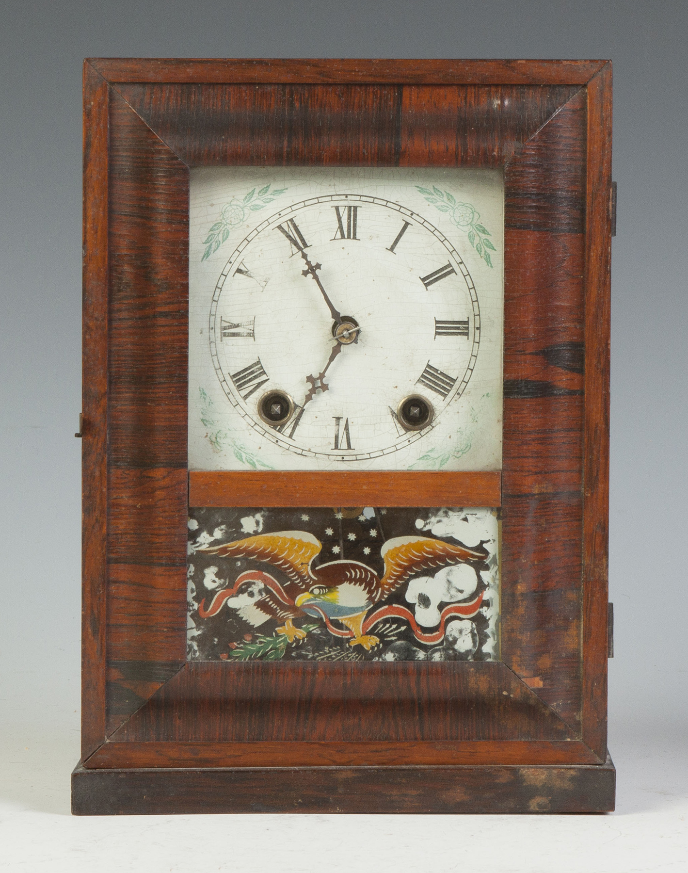 Appraisal: Waterbury Miniature Obverse Ogee Cottage Clock Rosewood case original finish