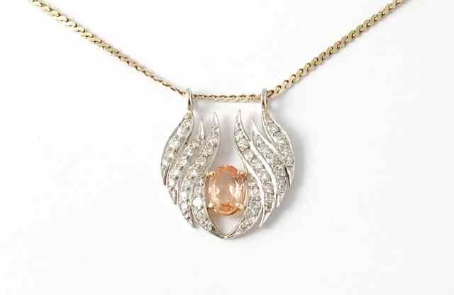 Appraisal: DIAMOND PEACH GEMSTONE AND FOURTEEN KARAT GOLD PENDANT NECKLACE Chain