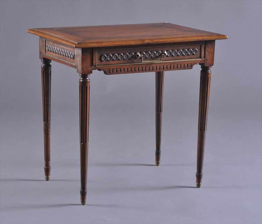 Appraisal: LOUIS XVI PROVINCIAL CARVED WALNUT TABLE CRIRE The molded top